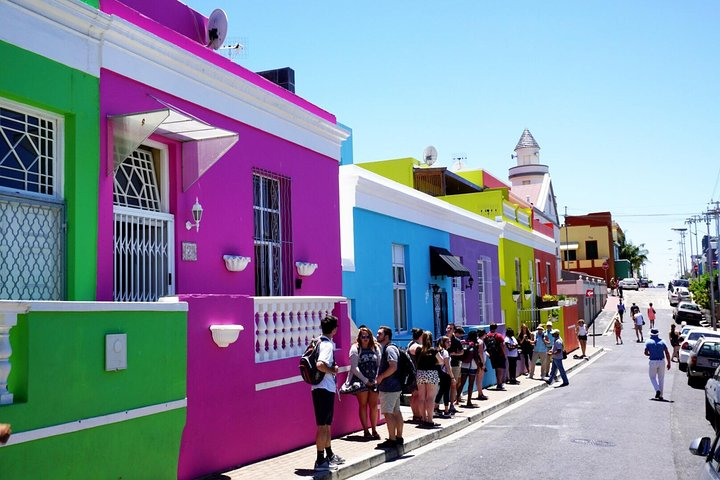 Explore the colorful streets of Bo Kaap and immerse yourself in the rich history and culture of Cape Town while engaging with locals and discovering unique stories of this vibrant community.